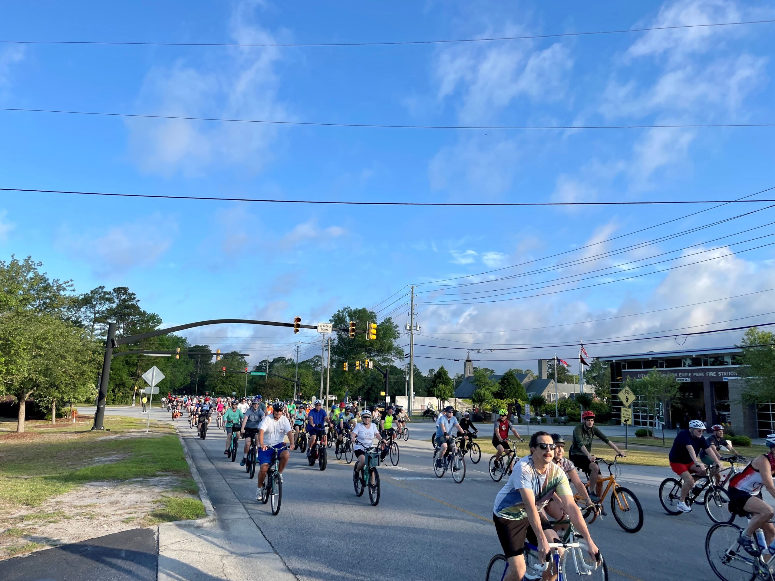 50+ bicycle riders in the 2022 River to Sea Bike Ride on Independence Blvd.
