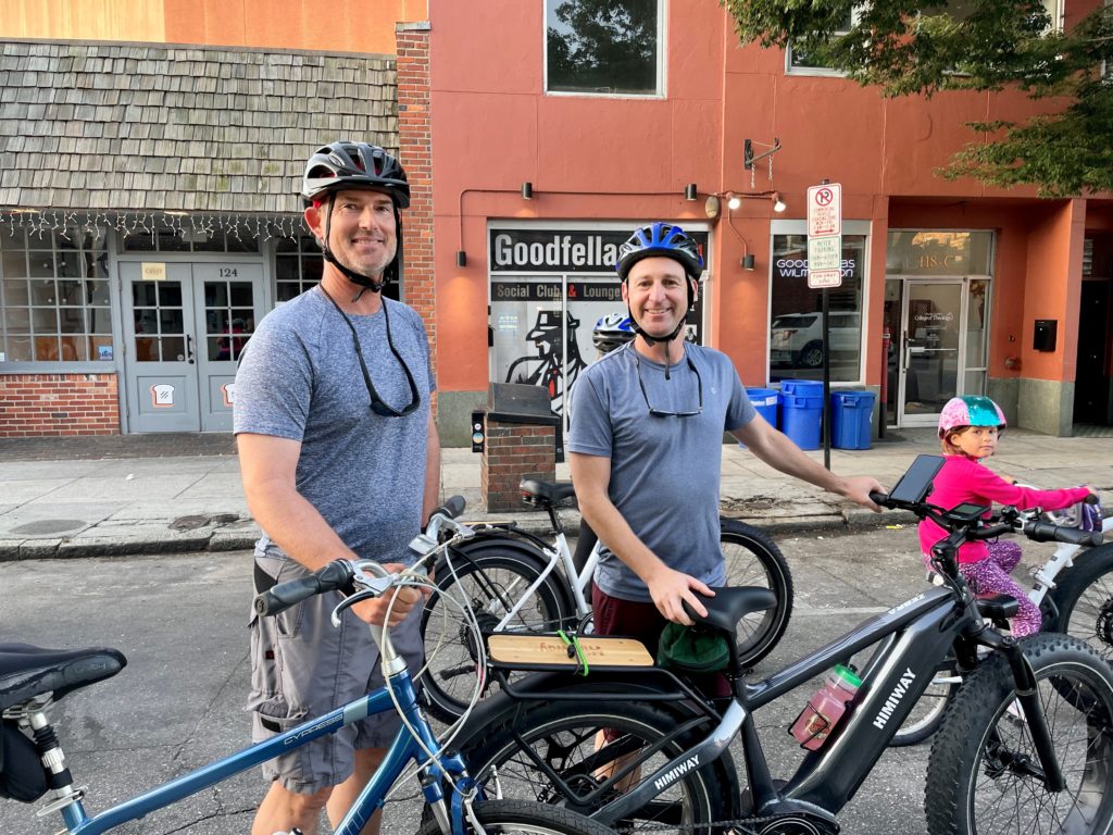 Bicyclists on Princess Street wearing helmets